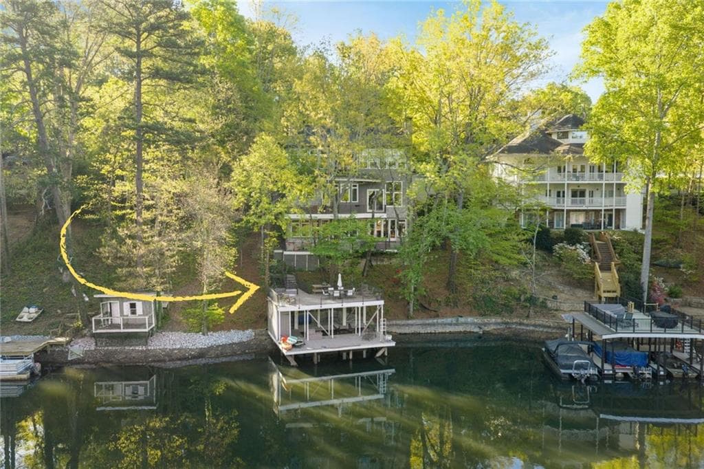 3 bedroom, 4 bathroom, 5,032 sq ft single family residence sold at 606 Hilltop Lane, Berkeley Lake, GA 30096