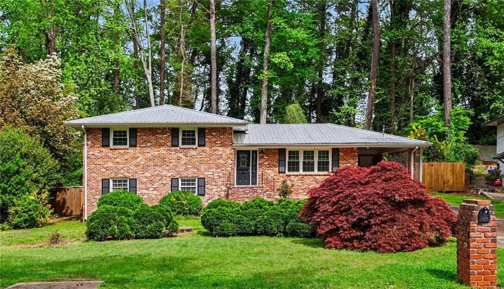 4 bedroom, 2 bathroom, 1,967 sq ft single family residence for sale at 1455 Sanden Ferry Drive, Decatur, GA 30033