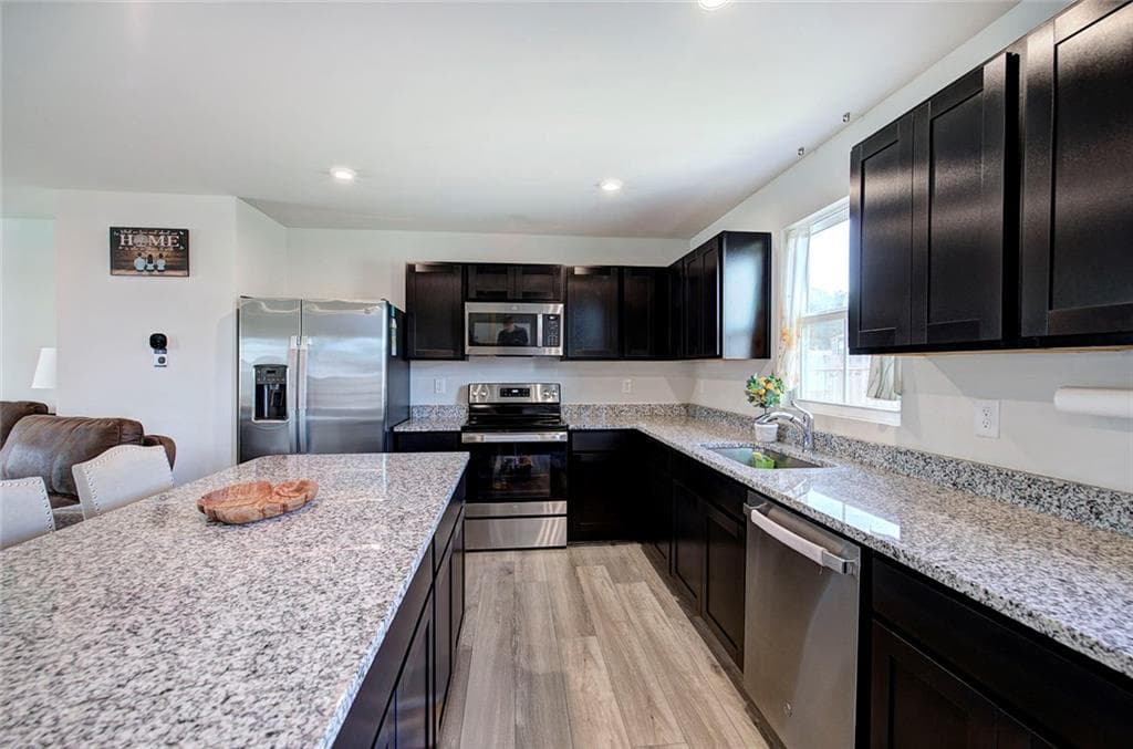 4 bedroom, 3 bathroom, 1,903 sq ft single family residence for sale at 384 Cartecay Drive, Calhoun, GA 30701 — photo 7