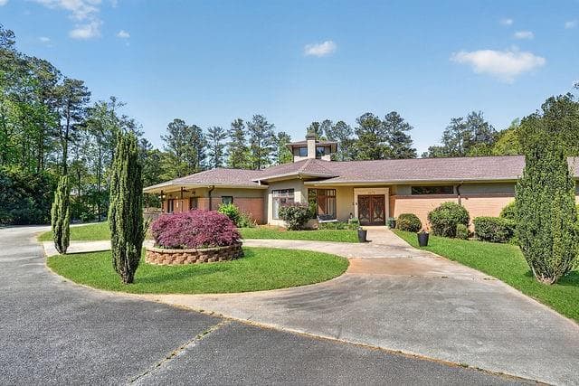 6 bedroom, 8 bathroom, 7,400 sq ft single family residence for sale at 3073 Demooney Road, South Fulton, GA 30349