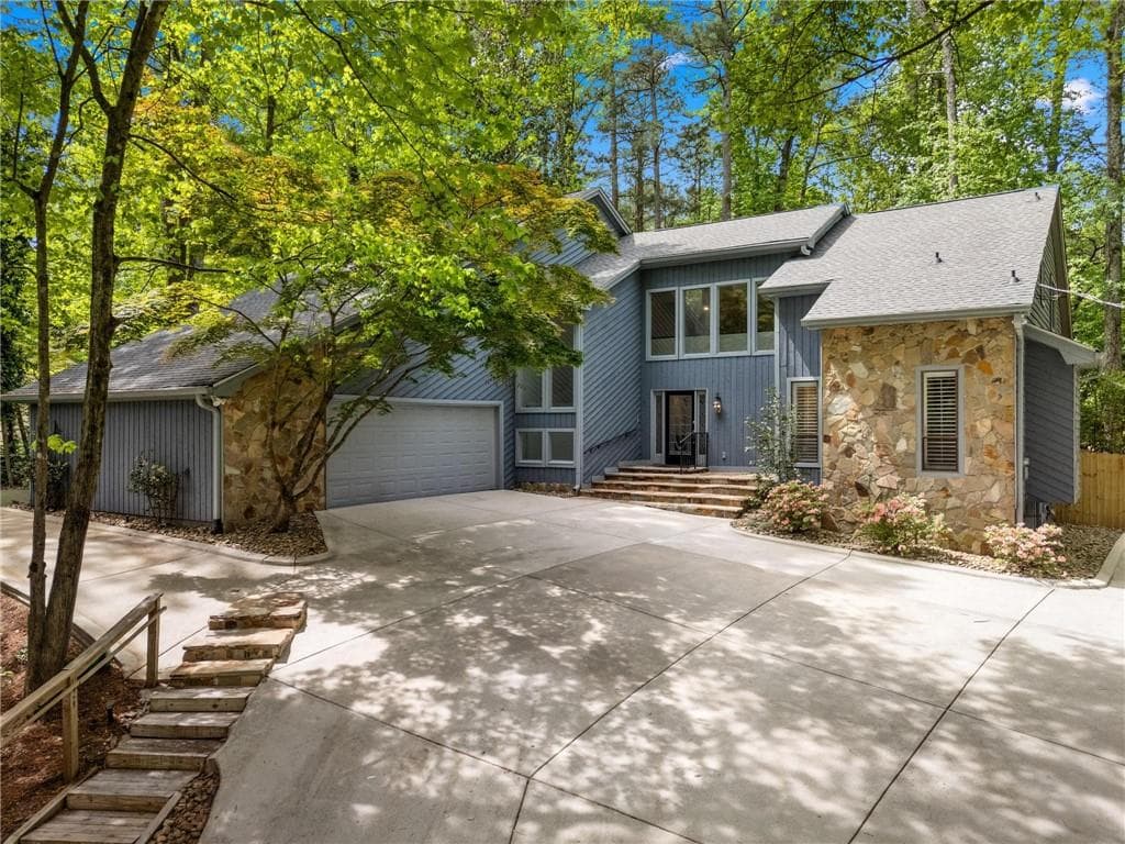 4 bedroom, 4 bathroom, 4,388 sq ft single family residence sold at 990 Ivy Falls Drive, Atlanta, GA 30328