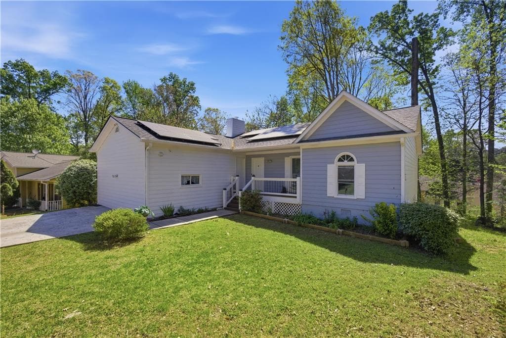 3 bedroom, 2 bathroom, 1,215 sq ft single family residence for sale at 3122 Morris Lane, Lawrenceville, GA 30044 — photo 2