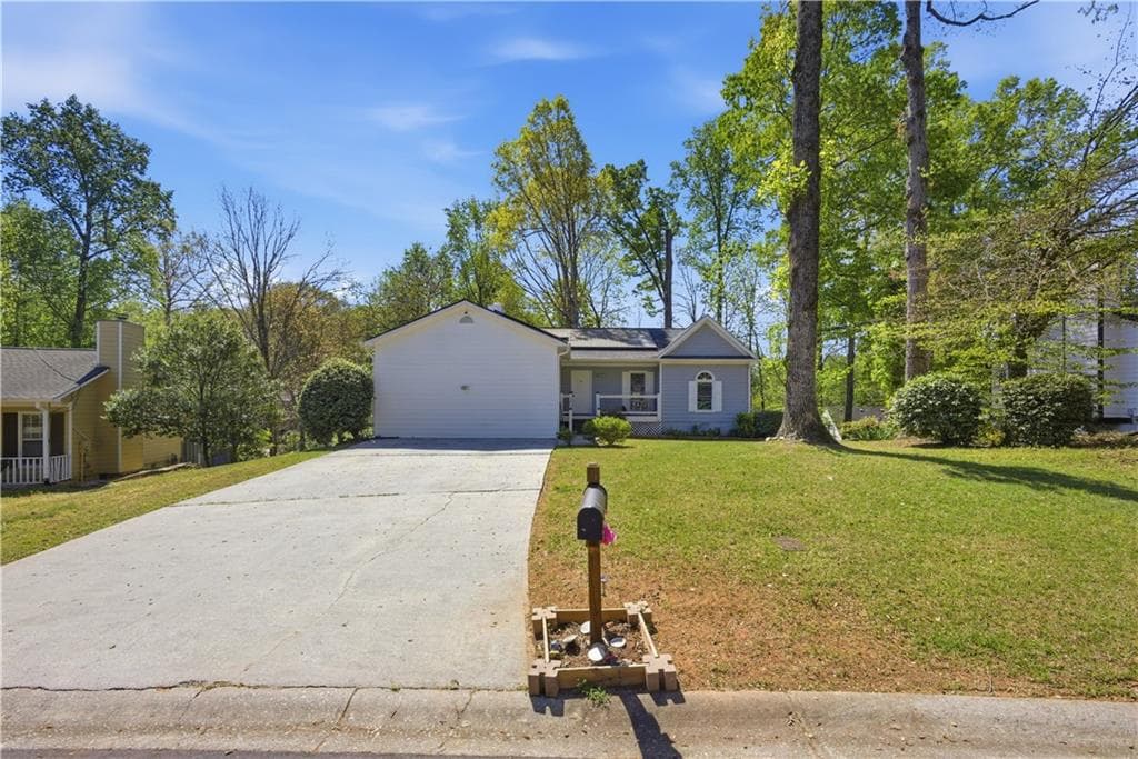 3 bedroom, 2 bathroom, 1,215 sq ft single family residence for sale at 3122 Morris Lane, Lawrenceville, GA 30044 — photo 4