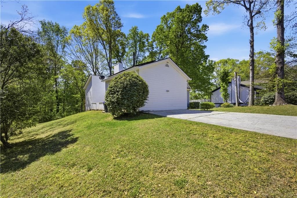 3 bedroom, 2 bathroom, 1,215 sq ft single family residence for sale at 3122 Morris Lane, Lawrenceville, GA 30044 — photo 6