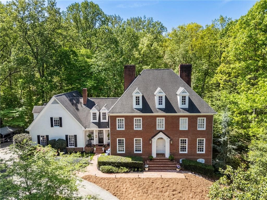 7 bedroom, 7 bathroom, 7,459 sq ft single family residence sold at 420 Fawn Glen Drive, Roswell, GA 30075