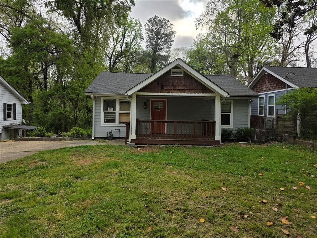 3 bedroom, 2 bathroom, 1,325 sq ft single family residence for sale at 431 Lanier Street, Atlanta, GA 30318 — photo 1 of 18