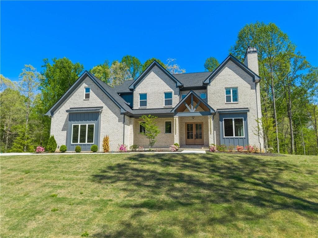 5 bedroom, 5 bathroom, 4,669 sq ft single family residence for sale at 1136 Lexington Ridge Road, Hoschton, GA 30548
