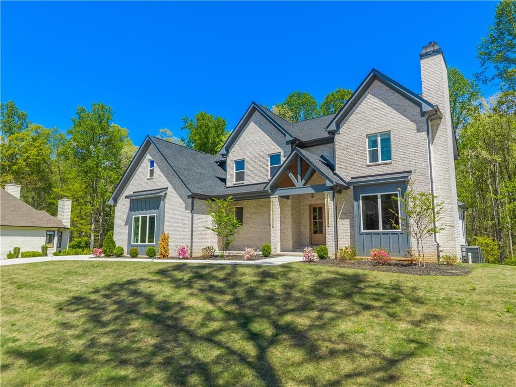5 bedroom, 5 bathroom, 4,669 sq ft single family residence for sale at 1136 Lexington Ridge Road, Hoschton, GA 30548 — photo 3