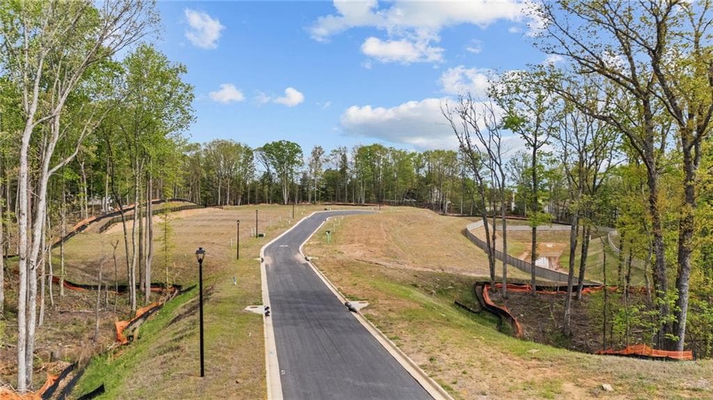 4 bedroom, 3 bathroom, 2,200 sq ft single family residence for sale at 4126 Eberly Way, Flowery Branch, GA 30542 — photo 2