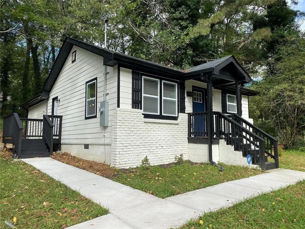 3 bedroom, 2 bathroom, 1,144 sq ft single family residence for sale at 2581 Hood Avenue, Atlanta, GA 30318 — photo 1 of 15