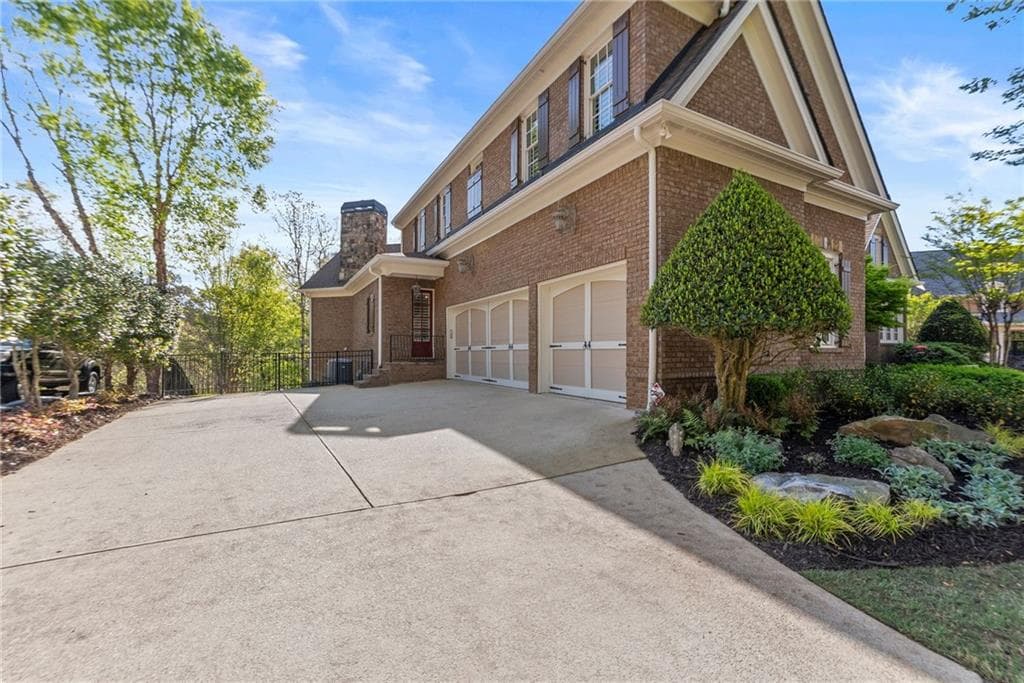5 bedroom, 7 bathroom, 8,653 sq ft single family residence for sale at 6221 Random Winds Bluff, Gainesville, GA 30506 — photo 7