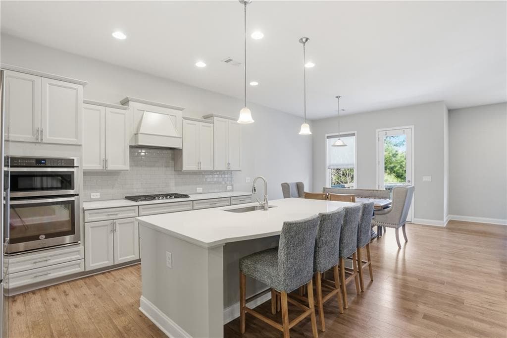 7 bedroom, 6 bathroom, 6,192 sq ft single family residence for sale at 3813 Whithorn Way, Kennesaw, GA 30152 — photo 5