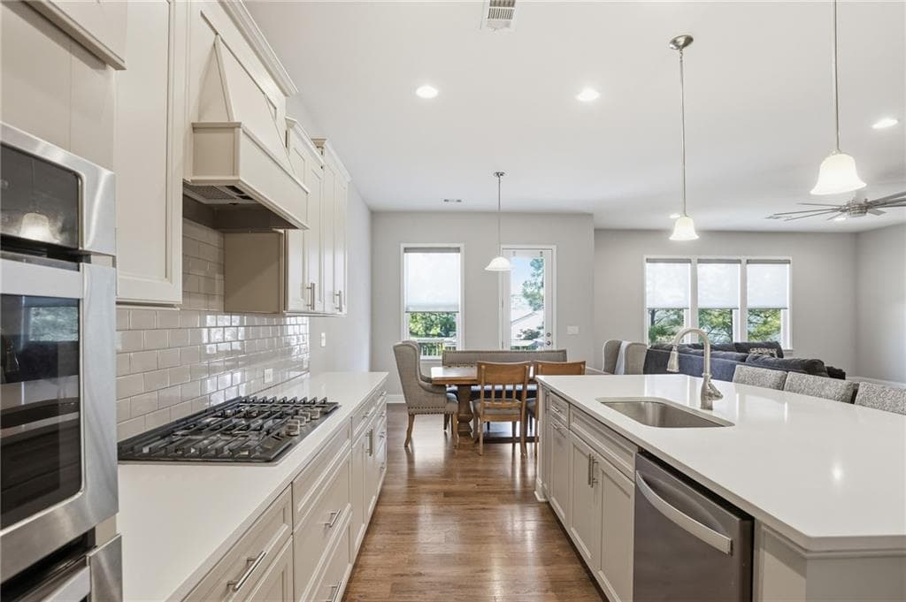 7 bedroom, 6 bathroom, 6,192 sq ft single family residence for sale at 3813 Whithorn Way, Kennesaw, GA 30152 — photo 7