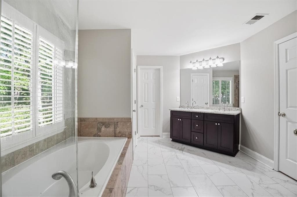 4 bedroom, 3 bathroom, 2,400 sq ft single family residence for sale at 1795 Ivey Trace, Cumming, GA 30041 — photo 6