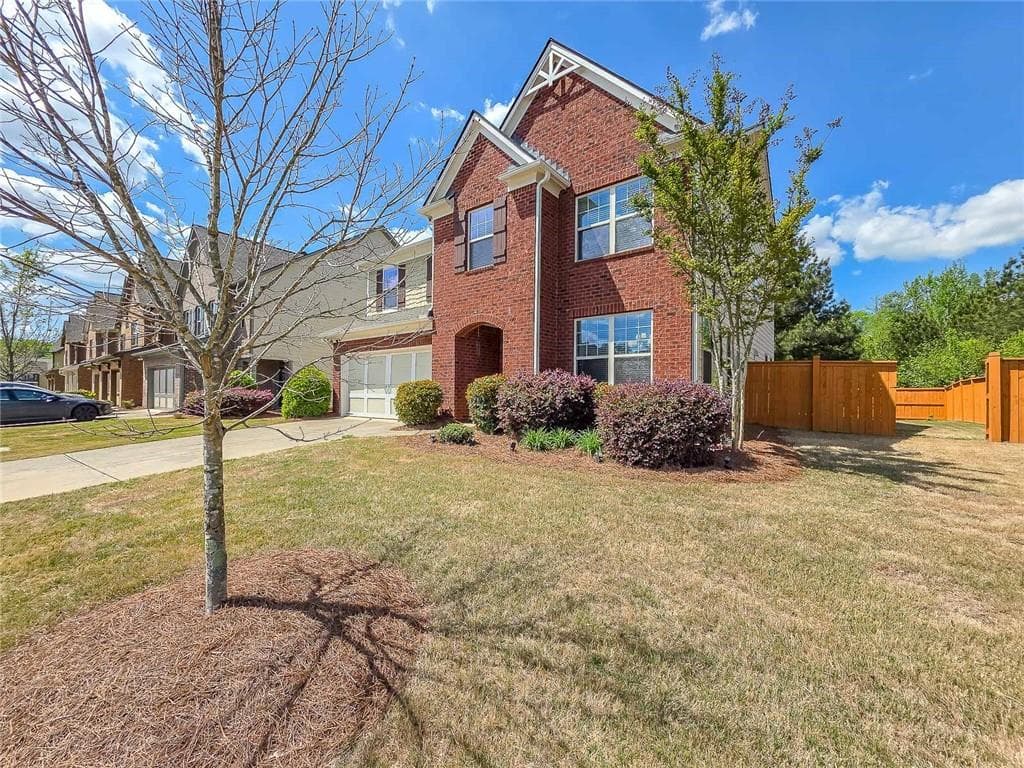 4 bedroom, 3 bathroom, 3,163 sq ft single family residence for sale at 5620 Shiloh Woods Drive, Cumming, GA 30040 — photo 2