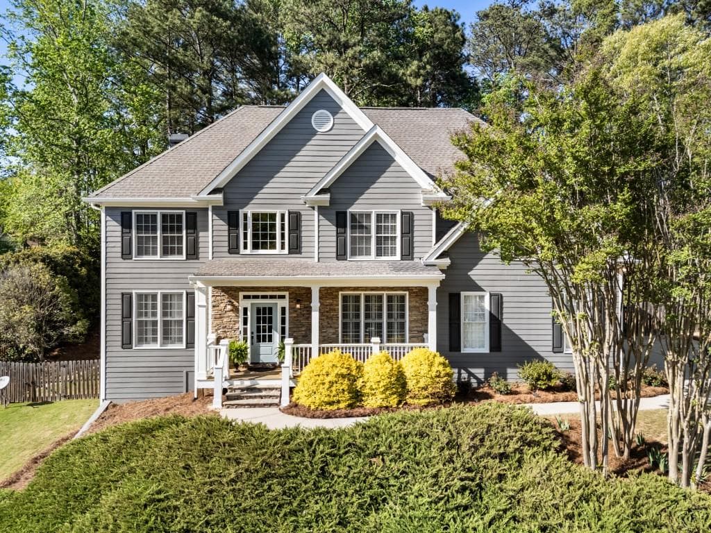 4 bedroom, 5 bathroom, 4,500 sq ft single family residence sold at 7420 Regent Court, Cumming, GA 30040