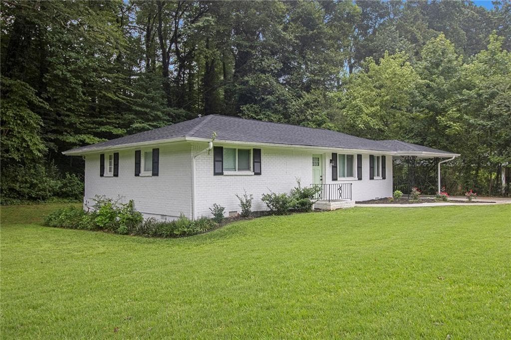 3 bedroom, 2 bathroom, 1,432 sq ft single family residence for sale at 1595 Moncrief Circle, Decatur, GA 30033 — photo 2