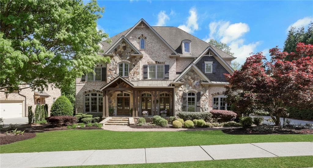 6 bedroom, 7 bathroom, 7,065 sq ft single family residence for sale at 1670 Cone Flower Way, Suwanee, GA 30024