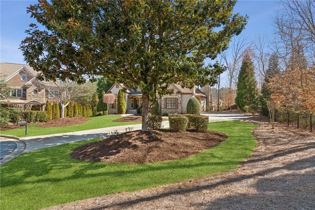 4 bedroom, 5 bathroom, 3,958 sq ft single family residence for sale at 5640 Copper Creek Pass, Cumming, GA 30040 — photo 3