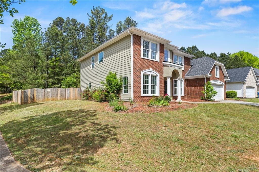 5 bedroom, 3 bathroom, 3,128 sq ft single family residence for sale at 3713 The Great Drive, Atlanta, GA 30349 — photo 5