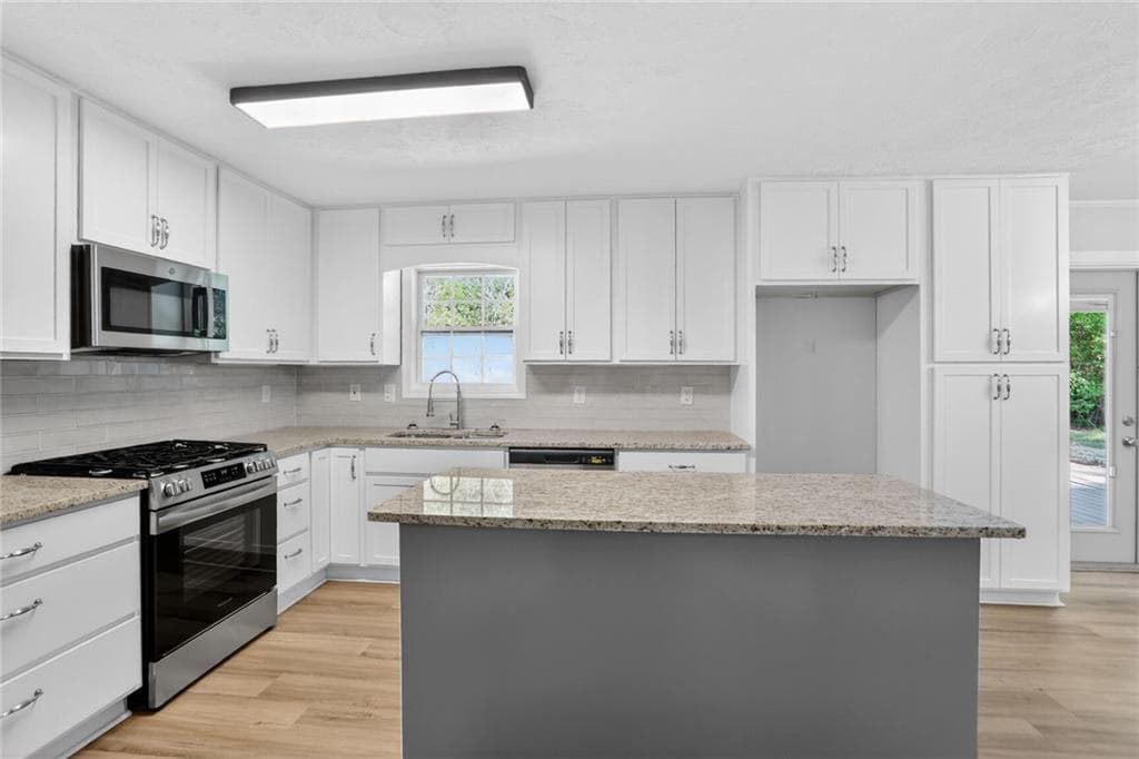 3 bedroom, 2 bathroom, 1,455 sq ft single family residence under contract at 1971 Wilson Road, Conyers, GA 30012 — photo 3
