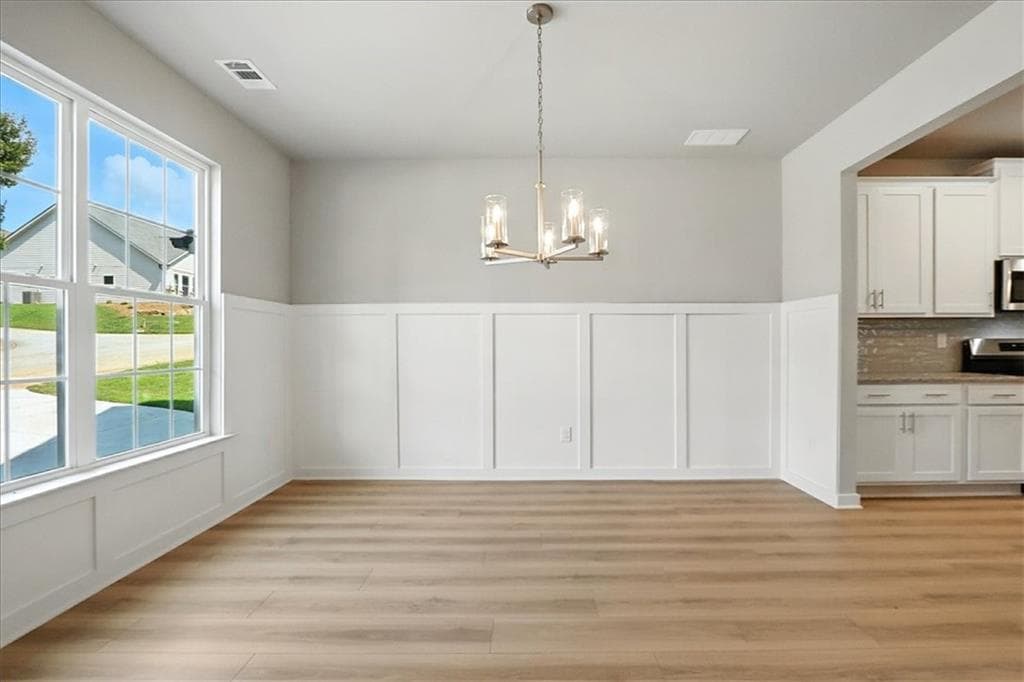 4 bedroom, 3 bathroom, 2,605 sq ft single family residence for sale at 4034 Links Boulevard, Jefferson, GA 30549 — photo 4