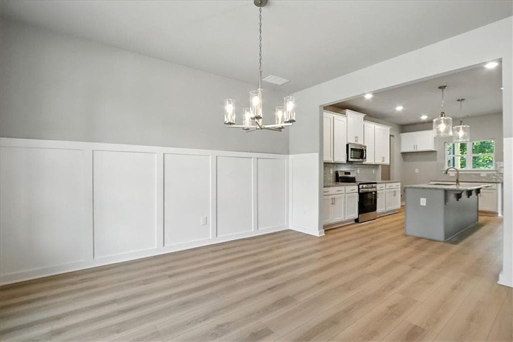 4 bedroom, 3 bathroom, 2,605 sq ft single family residence for sale at 4034 Links Boulevard, Jefferson, GA 30549 — photo 5