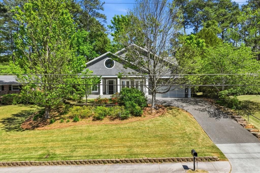 5 bedroom, 7 bathroom, 7,608 sq ft single family residence sold at 1265 Jody Lane, Atlanta, GA 30329