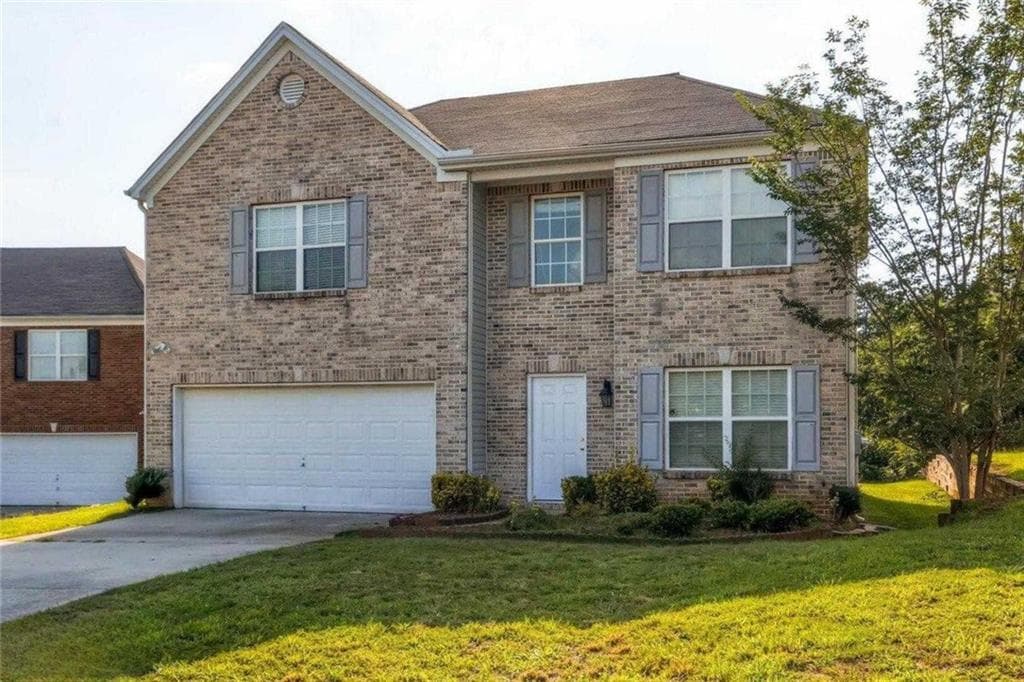 4 bedroom, 3 bathroom, 2,556 sq ft single family residence for sale at 5493 Wexford Pass, Atlanta, GA 30349 — photo 1 of 3