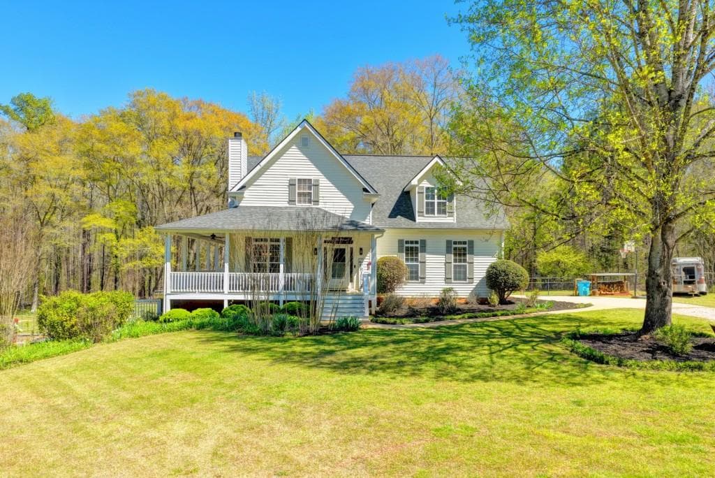 4 bedroom, 3 bathroom, 4,109 sq ft single family residence for sale at 1555 Lower River Road, Covington, GA 30016