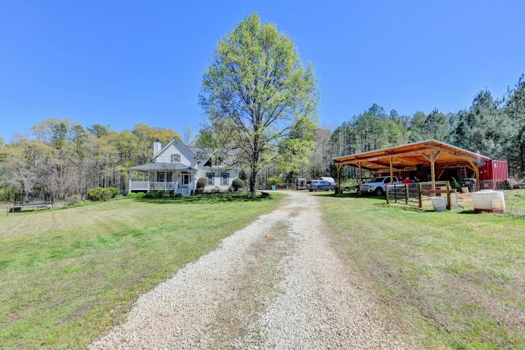 4 bedroom, 3 bathroom, 4,109 sq ft single family residence for sale at 1555 Lower River Road, Covington, GA 30016 — photo 3