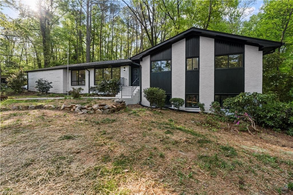 6 bedroom, 5 bathroom, 3,600 sq ft single family residence for sale at 5253 Oxbow Road, Tucker, GA 30087 — photo 1 of 104