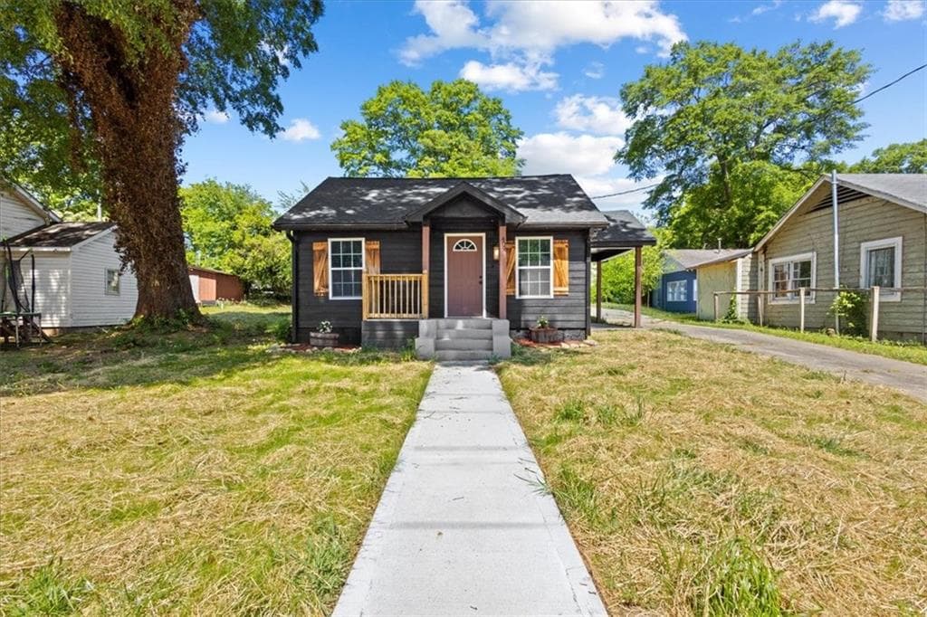 3 bedroom, 2 bathroom, 1,248 sq ft single family residence for sale at 409 Calhoun Avenue, Rome, GA 30161 — photo 2
