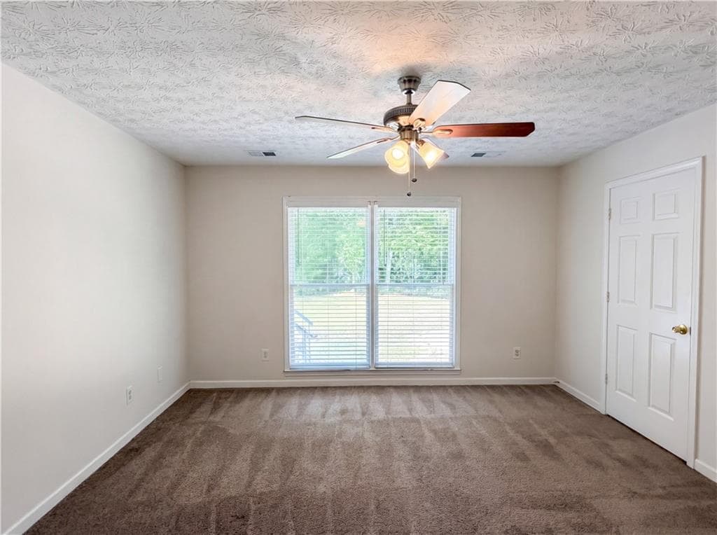 3 bedroom, 2 bathroom, 1,660 sq ft single family residence for sale at 213 Carl Parker Road, Hampton, GA 30228 — photo 4