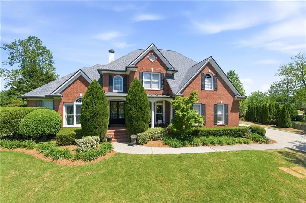 6 bedroom, 5 bathroom, 5,615 sq ft single family residence for sale at 5320 Brookglen Court, Cumming, GA 30040