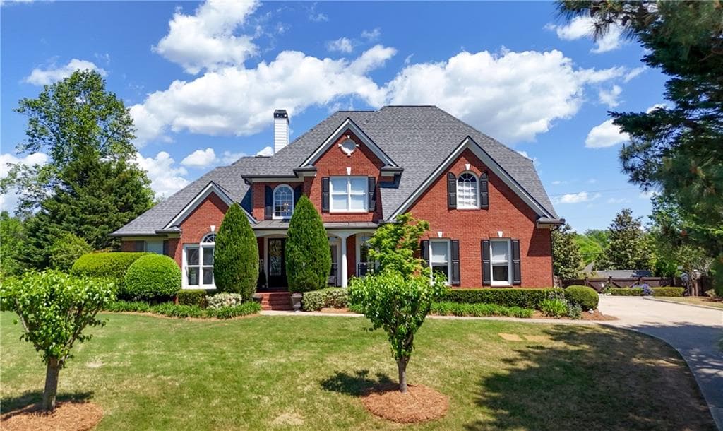 6 bedroom, 5 bathroom, 5,615 sq ft single family residence for sale at 5320 Brookglen Court, Cumming, GA 30040 — photo 2