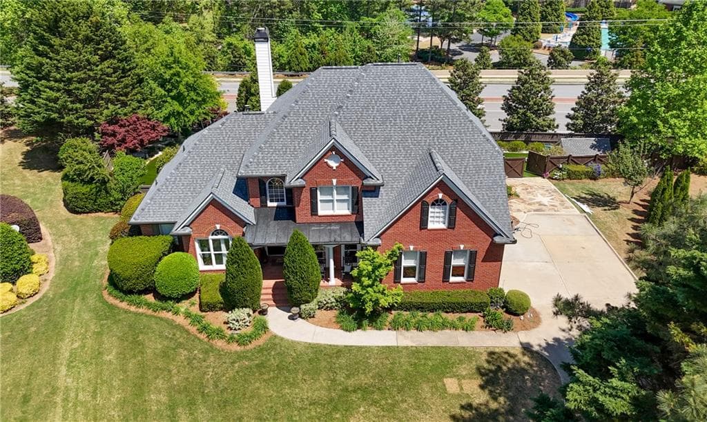 6 bedroom, 5 bathroom, 5,615 sq ft single family residence for sale at 5320 Brookglen Court, Cumming, GA 30040 — photo 3