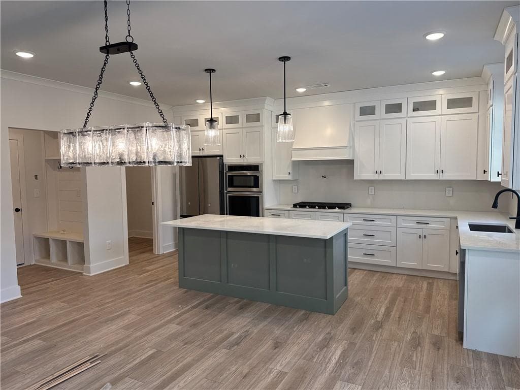 5 bedroom, 4 bathroom, 3,300 sq ft single family residence for sale at 2410 Reserve Manor Court, Lawrenceville, GA 30011 — photo 2