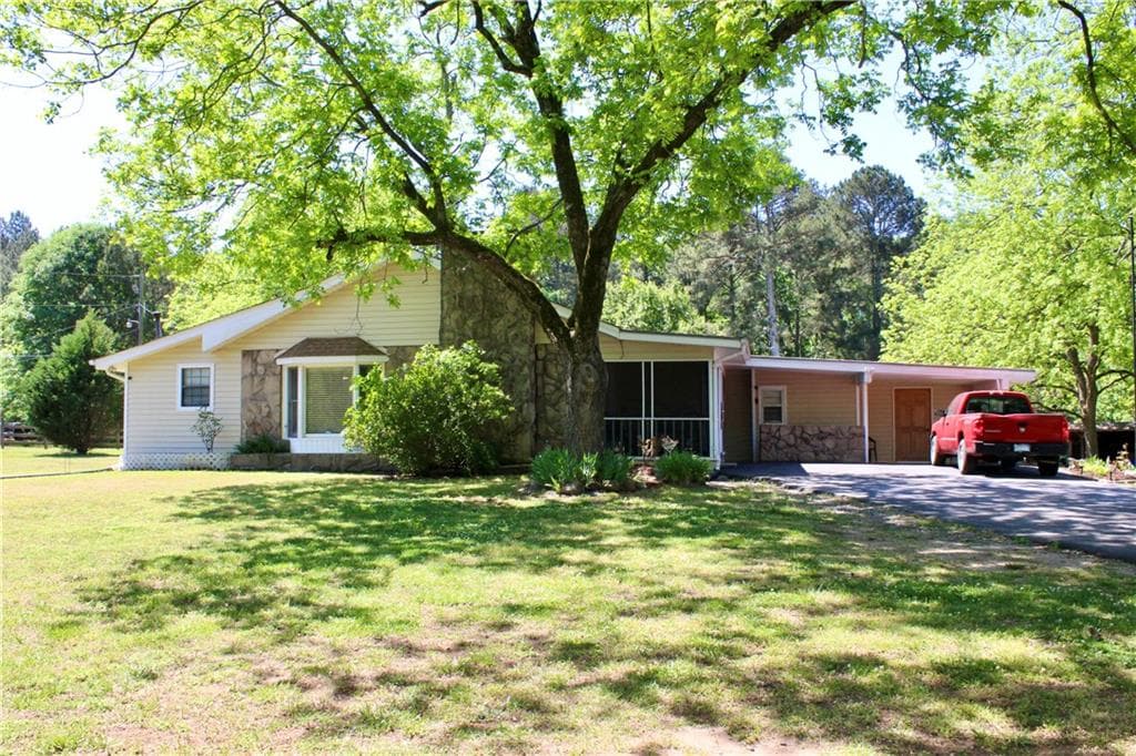3 bedroom, 2 bathroom, 1,937 sq ft single family residence for sale at 394 NW Hwy 211, Winder, GA 30680 — photo 2