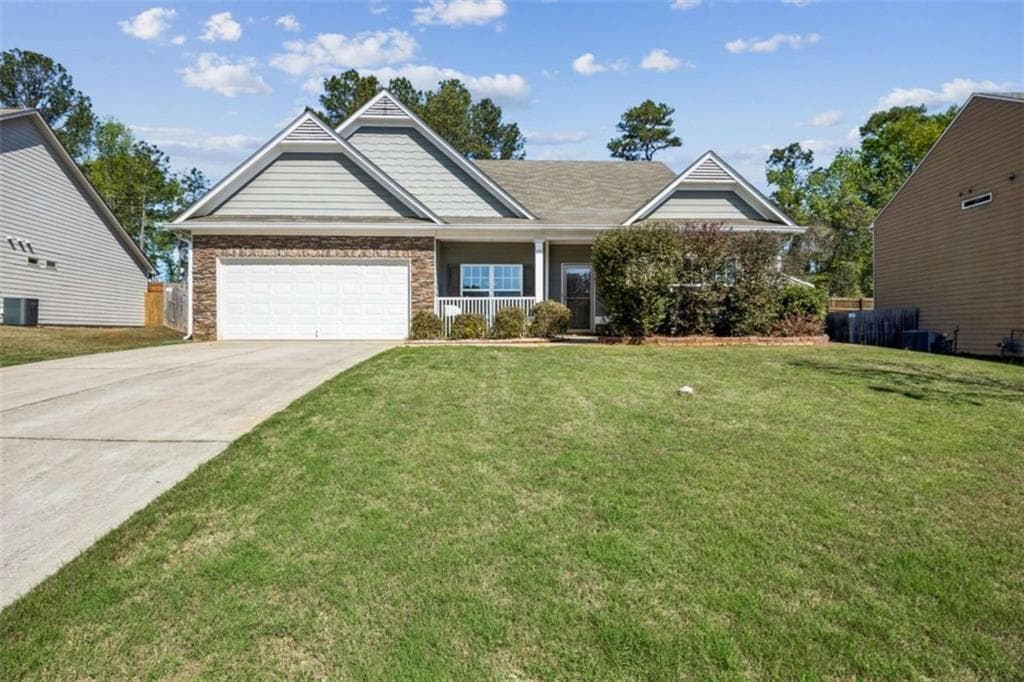 4 bedroom, 2 bathroom, 2,114 sq ft single family residence for sale at 753 Timpelton Court, Hoschton, GA 30548 — photo 2
