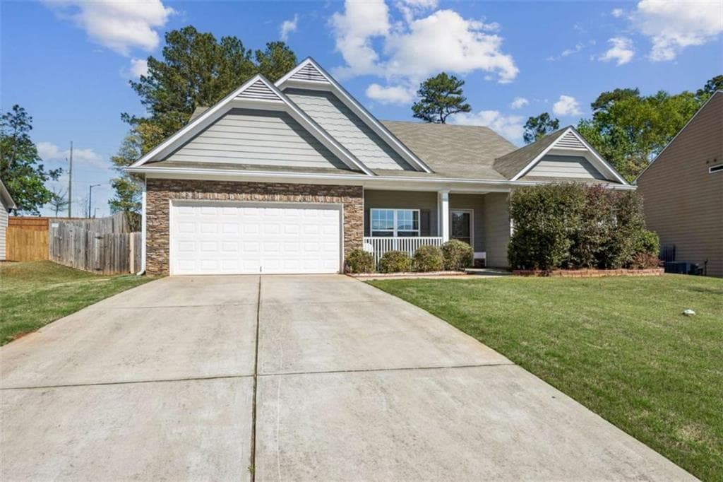 4 bedroom, 2 bathroom, 2,114 sq ft single family residence for sale at 753 Timpelton Court, Hoschton, GA 30548 — photo 3