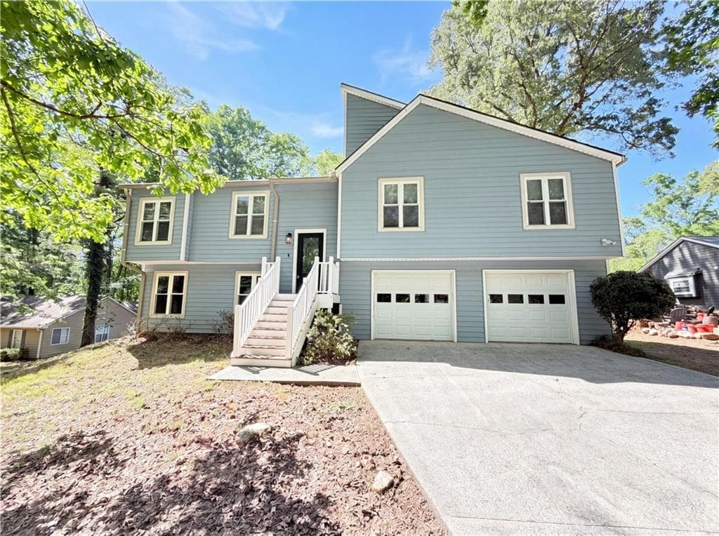 3 bedroom, 2 bathroom, 1,887 sq ft single family residence for sale at 1327 Towne Harbor Trail, Woodstock, GA 30189 — photo 1 of 23