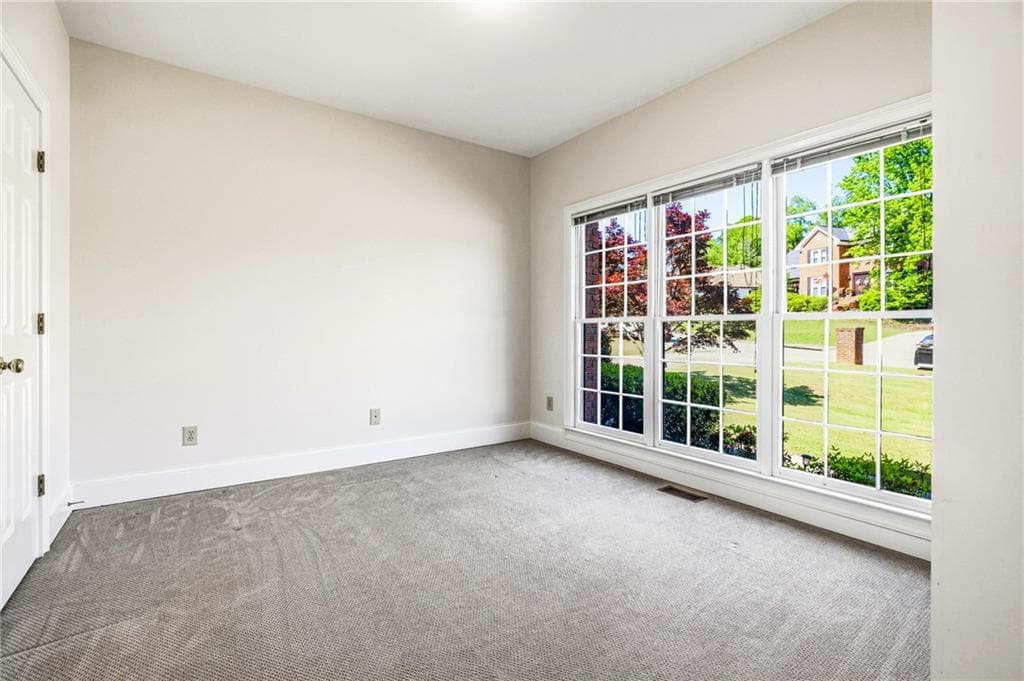 5 bedroom, 4 bathroom, 4,854 sq ft single family residence for sale at 1664 Holly Lake Circle, Snellville, GA 30078 — photo 8