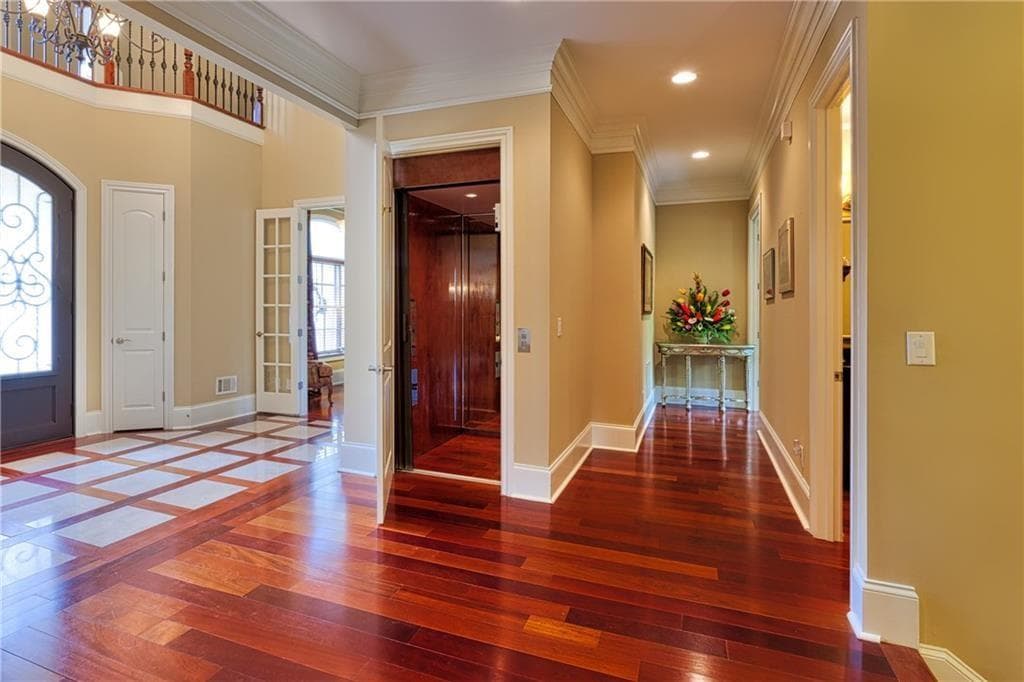 6 bedroom, 8 bathroom, 10,344 sq ft single family residence for sale at 6915 Prestons Estates, Atlanta, GA 30349 — photo 9