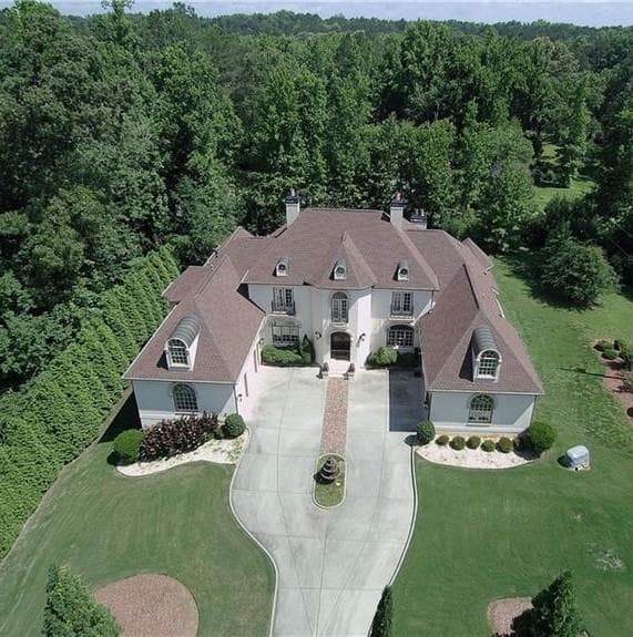 6 bedroom, 8 bathroom, 10,344 sq ft single family residence for sale at 6915 Prestons Estates, Atlanta, GA 30349 — photo 4