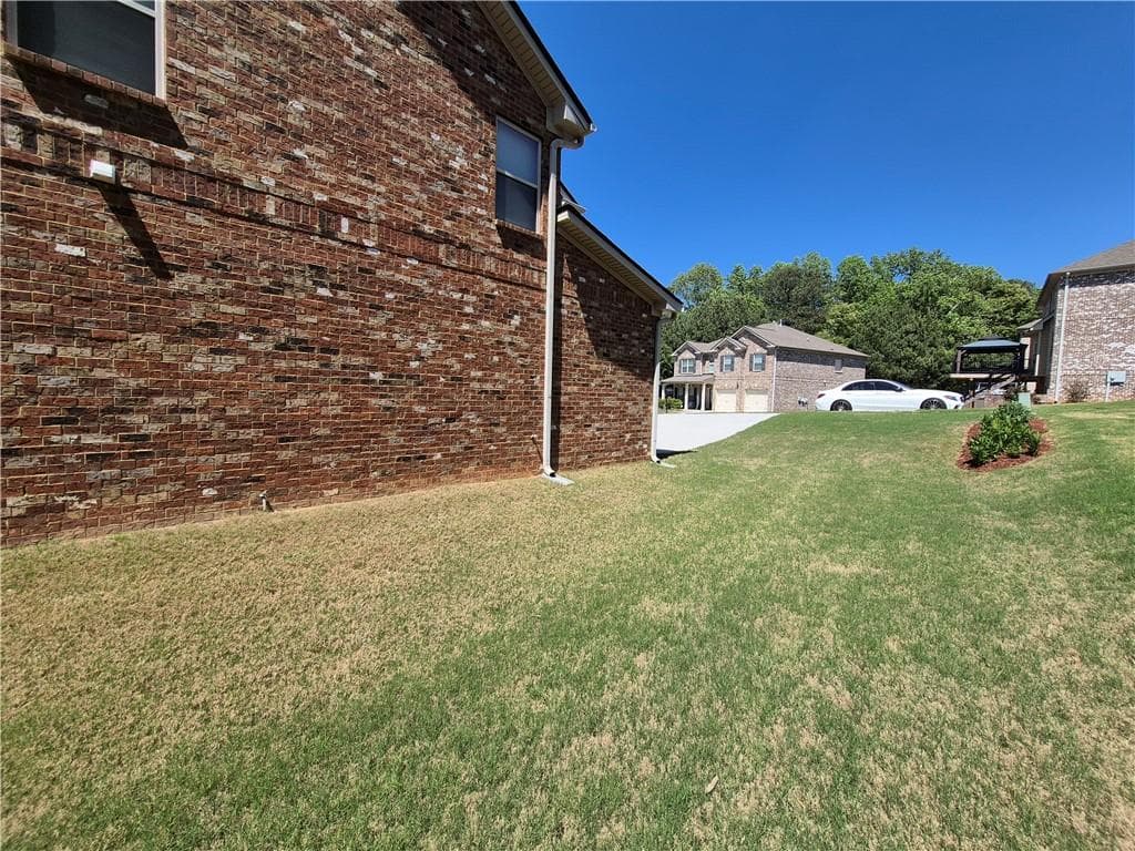 5 bedroom, 3 bathroom, 3,182 sq ft single family residence for sale at 2269 Reddy Farm Lane, Grayson, GA 30017 — photo 5