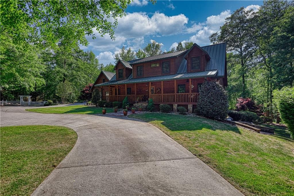8 bedroom, 6 bathroom, 4,774 sq ft single family residence for sale at 393 Edwards Road, Oxford, GA 30054