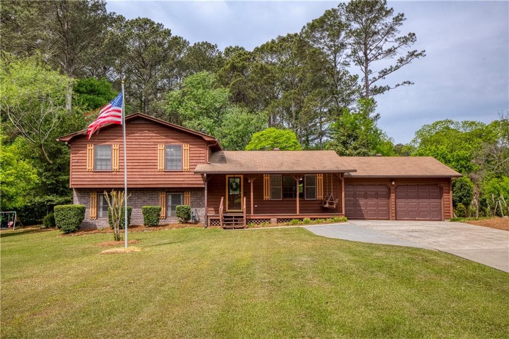 1111 Holly Hills Drive, Lilburn, GA 30047 — most recent listing photo