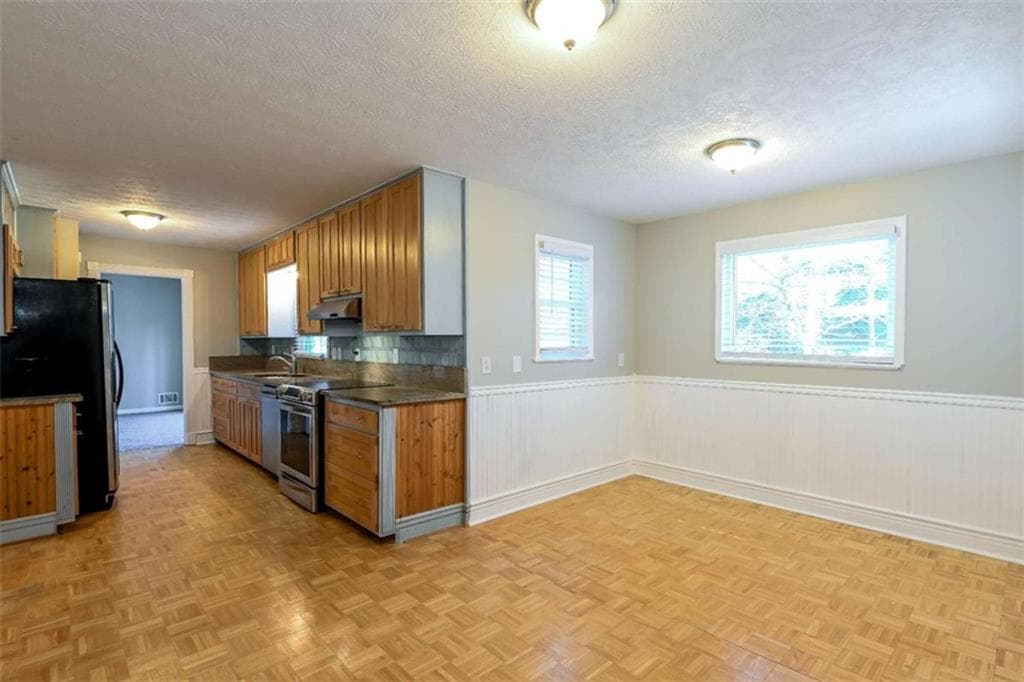 4 bedroom, 3 bathroom, 2,786 sq ft single family residence for sale at 5314 Delaware Court, Lilburn, GA 30047 — photo 3