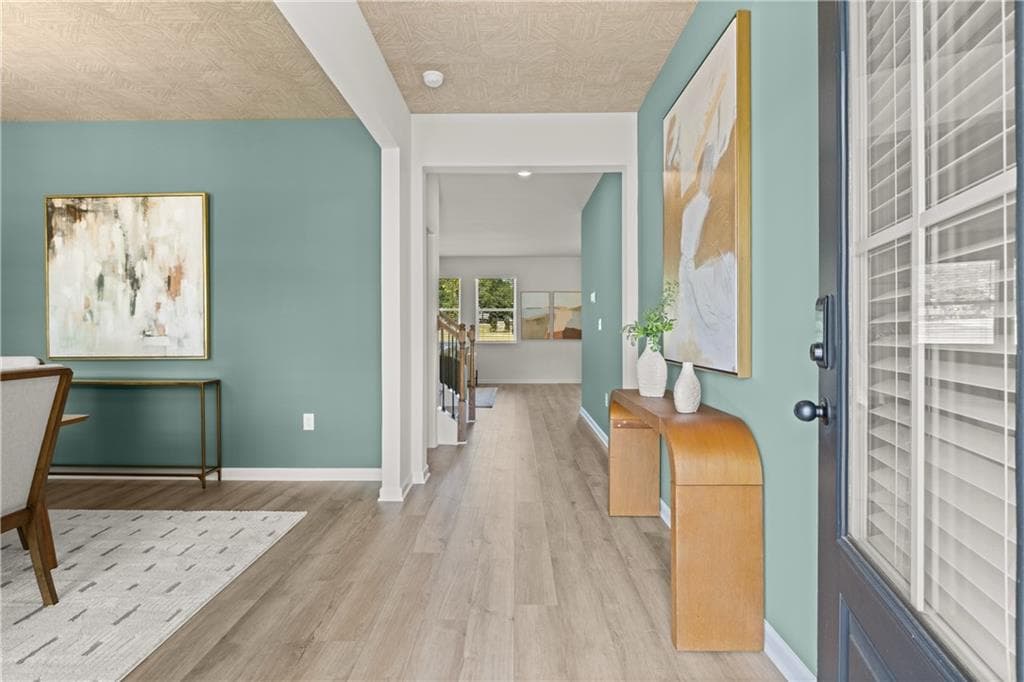 4 bedroom, 3 bathroom, 2,506 sq ft single family residence for sale at 1796 Kingsmere Run Drive, Loganville, GA 30052 — photo 2
